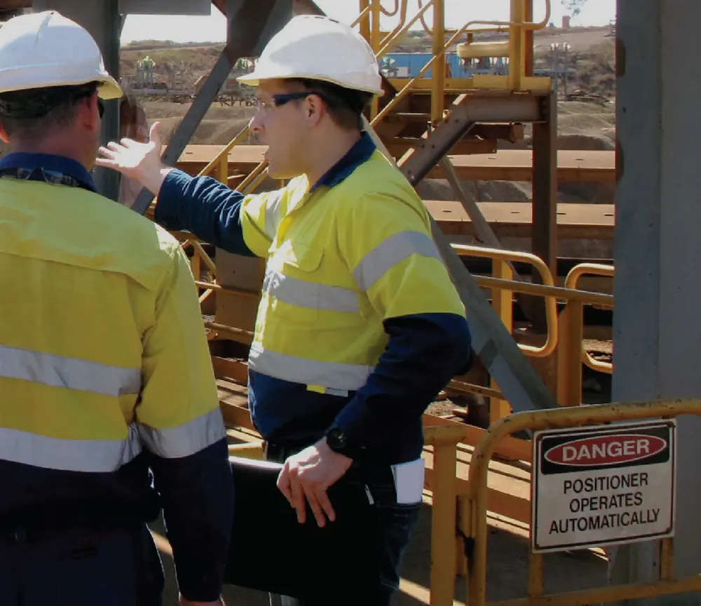 Bend-tech engineers discussing a project on site